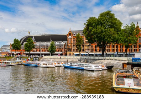 AMSTERDAM, NETHERLANDS - JUN 1, 2015: Port of Amsterdam. Amsterdam is the capital city and most populous city of the Kingdom of the Netherlands