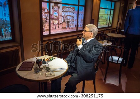 PRAGUE, CZECH REPUBLIC - JUNE 29, 2015: Old Czech beer pub in Grevin museum. Grevin is the museum of the wax figures in Prague