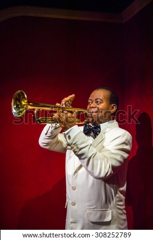PRAGUE, CZECH REPUBLIC - JUNE 29, 2015: Louie Armstrong plays, Grevin museum. Grevin is the museum of the wax figures in Prague