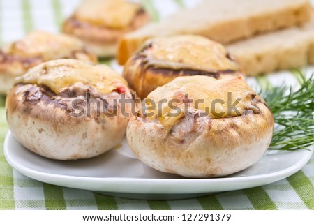 Stuffed mushrooms with cheese and dill and bread