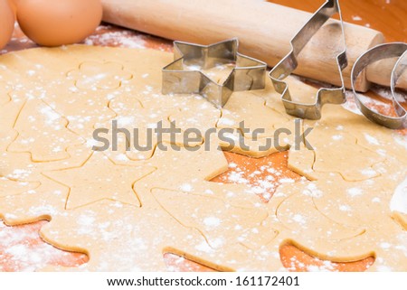 The process of baking homemade cookies. Cutting cookie molds.