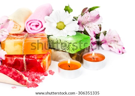 Spa background with flowers and bath accessories isolated on white background