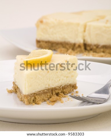 A lemon cheesecake on a linen background.