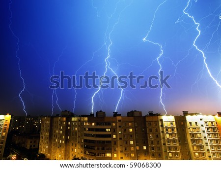 Lightning and thunderstorm above night city