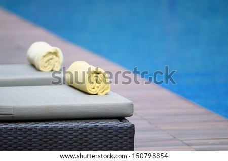towels at a luxury swimming pool