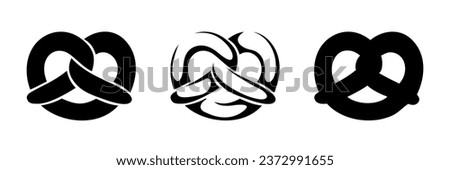 Pretzels. Black silhouettes of pretzels isolated on a white background. Vector illustration. Handmade illustration, not AI