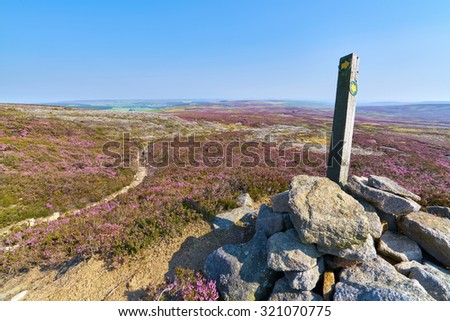 Hiking signpost at Edmundbyers Common in County Durham English countryside.