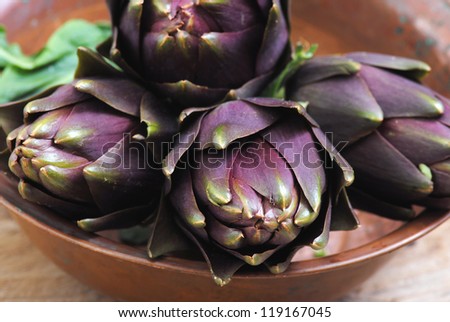 Fresh purple artichokes.Healthy eating, healthy lifestyles, bio food concept.Italian style.
