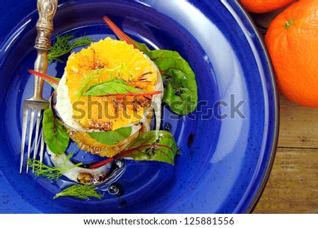 Colorful orange salad with fennel and herbs.Winter vitamins salad.Healthy, raw, light food.
