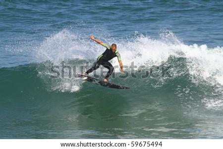 good surfer in action on a wave