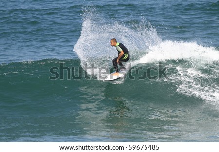 good surfer in action on a wave