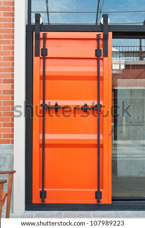The orange door with Metal door handle black