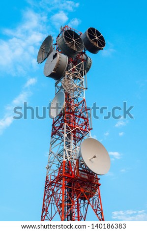 High radio antenna. On a sky background.