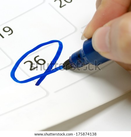 Calendars are drawn circle at 26 with a blue pen.