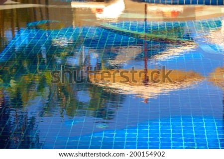 shadow umbrella in the pool