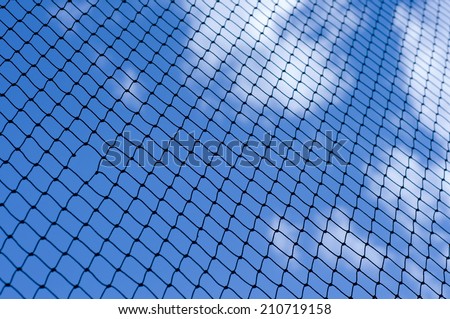Nice texture with black net, hole in it and clouds