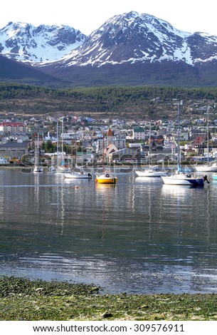 A view of Ushuaia, Tierra del Fuego. Boats line the harbor