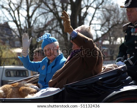 COPENHAGEN - APR 16: Denmark's Queen Margrethe celebrates her 70th birthday with other European Royals. The Queen rides an open carriage escorted by Hussars to Copenhagen City Hall on April 16, 2010 in Copenhagen.