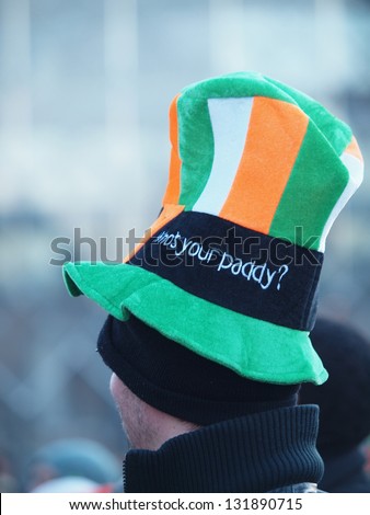 COPENHAGEN - MAR 17: Man with colourful hat at the annual St. Patrick\'s Day celebration and parade in front of Copenhagen City Hall, Denmark on March 17, 2013.