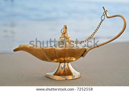 Genies lamp on seashore