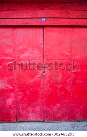 old red wood door at the rural home in Thailand