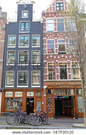 AMSTERDAM, NETHERLANDS - APRIL 3: Coffee shops in Red light district at city Amsterdam on April 3, 2014 in Amsterdam