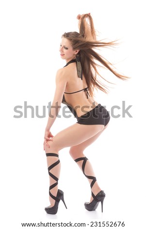go-go dancer  in black sexy swimsuit and black ribbon on legs dancing