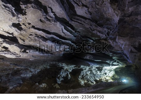 Kungur, Russia - November 25, 2014. Kungur Ice Cave. The ceiling of the cave as a cloud in the grotto ether