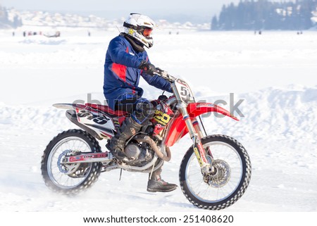 Dobryanka, Russia - February 7, 2015. Urban ice race. Motorcycle on winter tires on ice racing day