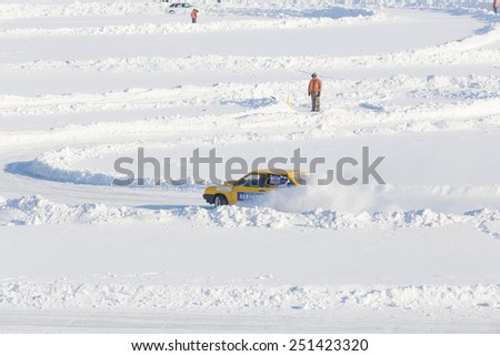 Dobryanka, Russia - February 7, 2015. Urban ice race. sport car on the road snow sports top view