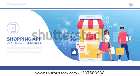 Happy couple doing online shopping together and carrying shopping bags, they used a retail app on a smartphone and purchased goods in a virtual store