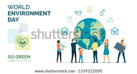 Multiethnic group of people cooperating for a sustainable eco-friendly lifestyle on world environment day: they are supporting planet earth, recycling and choosing renewable resources 