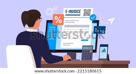 Professional businesswoman working with her computer, she is sending an e-invoice online
