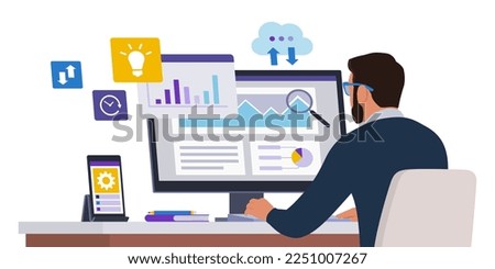 Corporate businessman sitting at desk and checking financial reports on his computer, business and technology concept