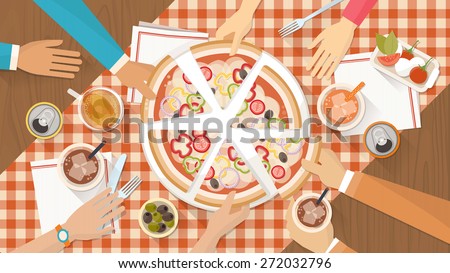 People having dinner together and sharing a huge pizza with drinks, hands top view