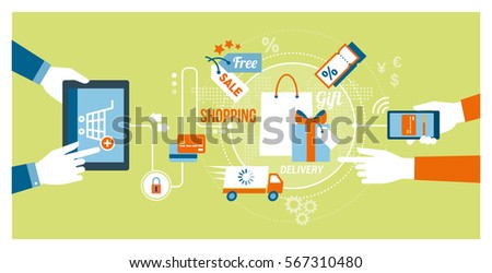 Online shopping and technology concept: users buying products and gifts online using a tablet and a smartphone