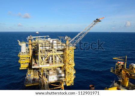 The gas flare is on the oil rig platform in the gulf of thailand ...