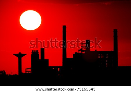 Factory silhouette in sunset light