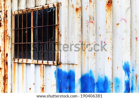 Rusty industrial metal cage