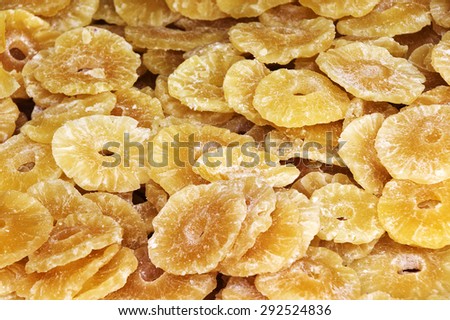 Dried pineapples fruits background