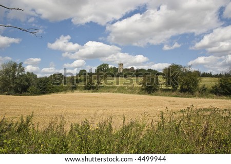 St James Church on the Hill at West Tilbury viewed across the Harvested fields.