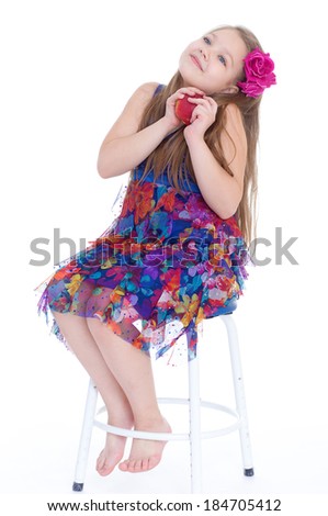 girl, fashion, apple and rose- little girl with braided hair and rose red apple. isolated on white background.