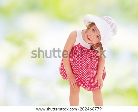 very curious little girl that considers.cheerful summer holiday,active lifestyle,happiness concept,carefree childhood concept.