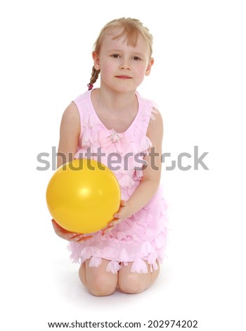 little girl hugging the ball.isolated on white background, sports life,happiness concept,happy childhood,carefree childhood,active lifestyle