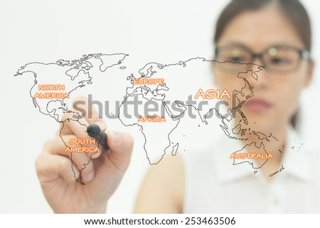 Business women drawing in front of screen