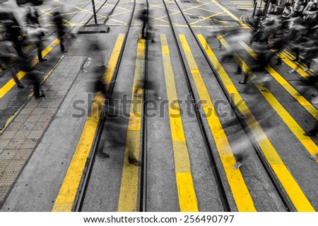 Motion blurred and color tone tuned crowded people background - take place in central district