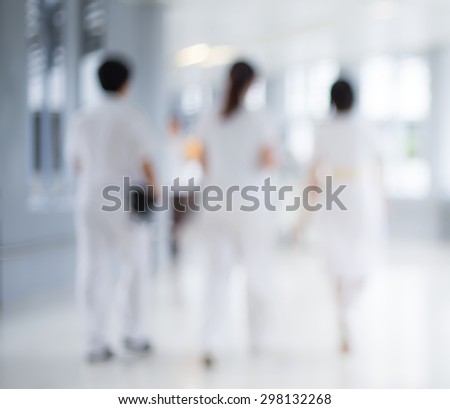 Blurred hospital and staff for background