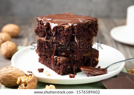 Similar – Image, Stock Photo Brownies cake squares on cooling rack. Chocolate fudge brownies