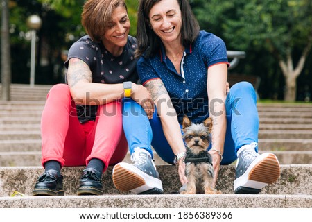 Similar – Image, Stock Photo Happy middle aged lesbian couple hugging outdoors