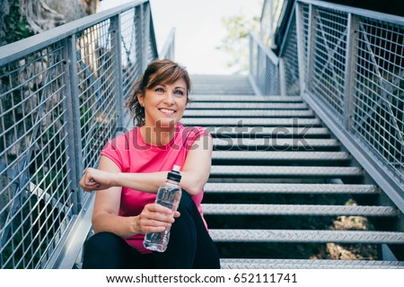 Similar – Image, Stock Photo Happy woman with bottle of beer in tent